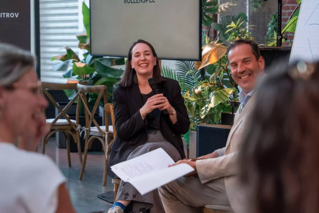 Interactie tussen spreker en deelnemers tijdens sales training
